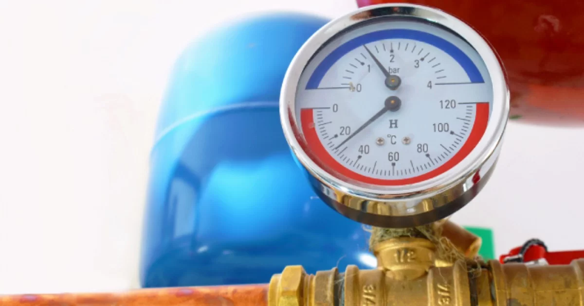 Plumber diagnosing low water pressure in a Tupelo, MS home